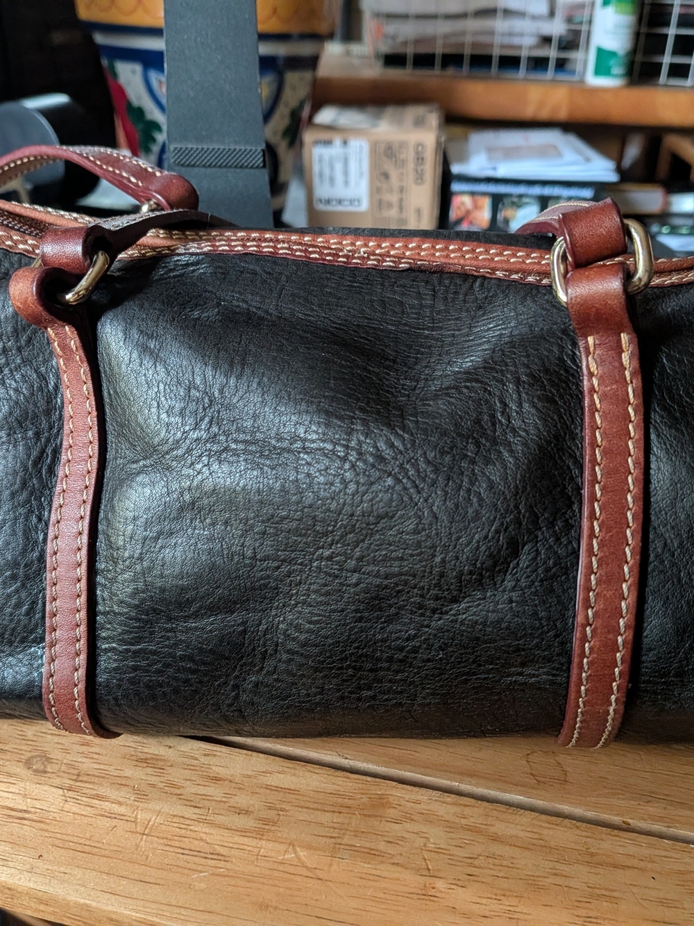 Dooney & Bourke Black Leather Barrel Bag with Brown Trim and Gold Hardware - Picture 4 of 7